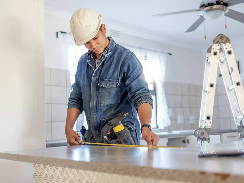 Construction Measurement And Handyman Doing Home Repair Renovation And Building A Counter Servic - Remodel Space Builds